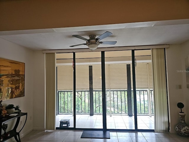 3076 Eastland Blvd Unit 210, Clearwater, FL 33761 - entryway featuring tile patterned floors, ceiling fan, and floor to ceiling windows