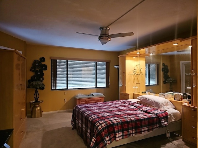 3076 Eastland Blvd Unit 210, Clearwater, FL 33761 - carpeted bedroom with a ceiling fan