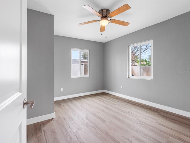 540 80th Ave, St Pete Beach, FL 33706 - spare room featuring wood finished floors and ceiling fan