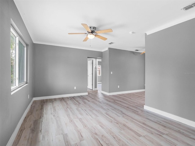540 80th Ave, St Pete Beach, FL 33706 - empty room with ceiling fan and light wood-type flooring