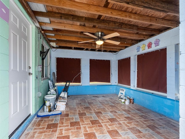 540 80th Ave, St Pete Beach, FL 33706 - unfurnished sunroom with a ceiling fan and beamed ceiling