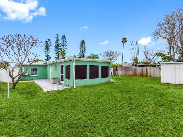 540 80th Ave, St Pete Beach, FL 33706 - back of house with stucco siding, a patio, and an outdoor structure