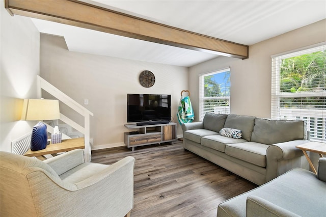 12835 74th Ave, Seminole, FL 33776 - living room with wood finished floors, healthy amount of natural light, stairway, and beam ceiling