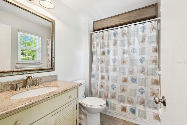 12835 74th Ave, Seminole, FL 33776 - full bath featuring vanity, a shower with shower curtain, and tile patterned floors
