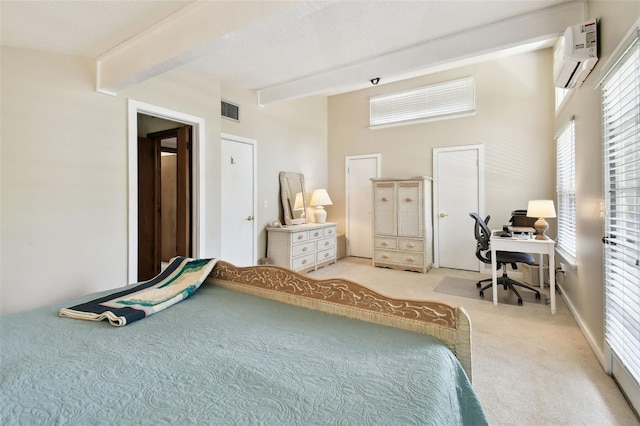 12835 74th Ave, Seminole, FL 33776 - carpeted bedroom featuring a wall unit AC, beamed ceiling, and an office area