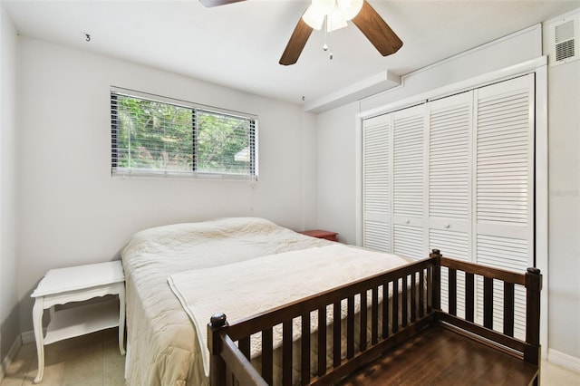 12835 74th Ave, Seminole, FL 33776 - bedroom featuring a closet and a ceiling fan