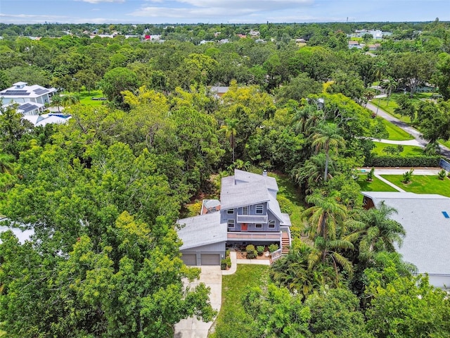 12835 74th Ave, Seminole, FL 33776 - aerial view of property and surrounding area featuring a forest
