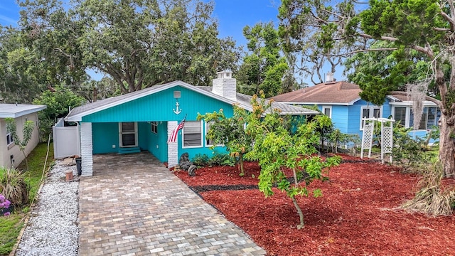 6428 Old Main St, New Port Richey, FL 34653 - view of front of property featuring a chimney
