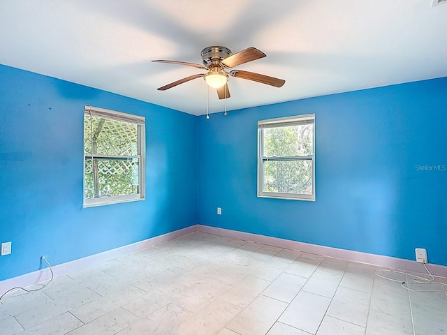 6428 Old Main St, New Port Richey, FL 34653 - unfurnished room with healthy amount of natural light and ceiling fan