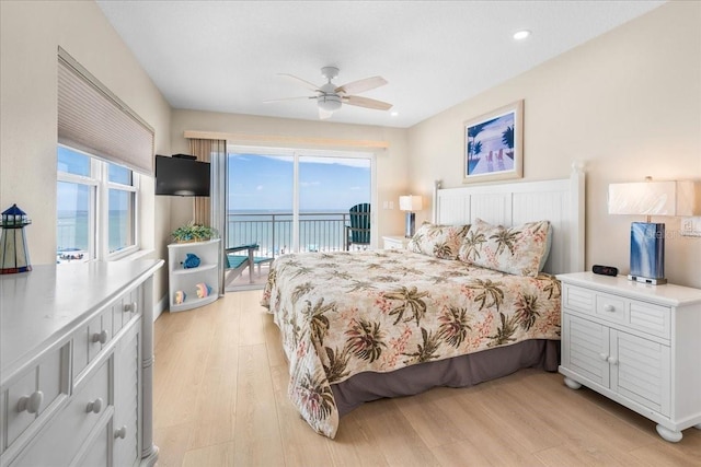 13000 Gulf Blvd Unit 309, Madeira Beach, FL 33708 - bedroom with access to exterior, light wood finished floors, multiple windows, and recessed lighting