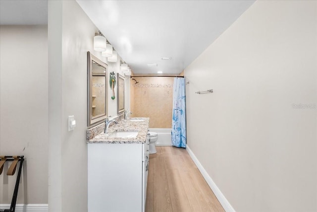 13000 Gulf Blvd Unit 309, Madeira Beach, FL 33708 - corridor with light wood-type flooring and a sink