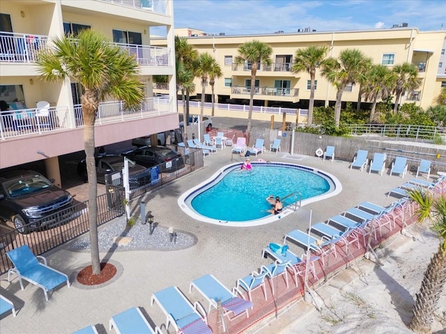 13000 Gulf Blvd Unit 309, Madeira Beach, FL 33708 - community pool featuring a patio