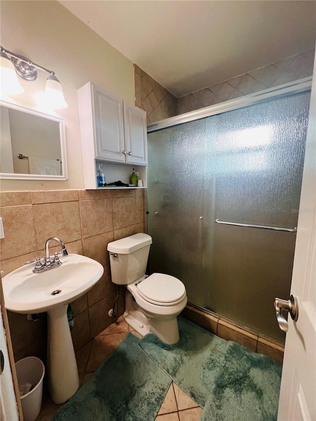 6316 Alaska Ave, New Port Richey, FL 34653 - full bath with tile walls, a shower stall, and tile patterned floors
