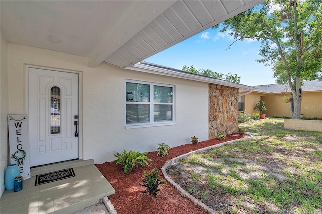 2585 Ridge Ln, Palm Harbor, FL 34684 - entrance to property featuring stucco siding
