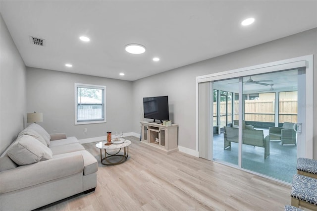 2585 Ridge Ln, Palm Harbor, FL 34684 - living area featuring light wood-style floors, recessed lighting, and ceiling fan