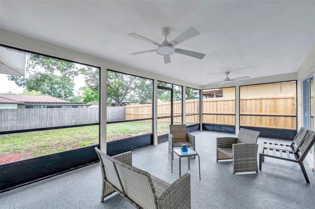 2585 Ridge Ln, Palm Harbor, FL 34684 - sunroom with a ceiling fan and outdoor lounge area