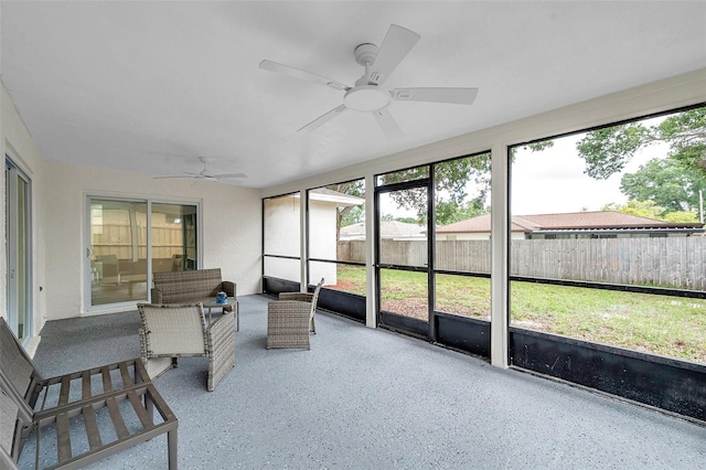 2585 Ridge Ln, Palm Harbor, FL 34684 - sunroom / solarium featuring a ceiling fan, plenty of natural light, and outdoor lounge area