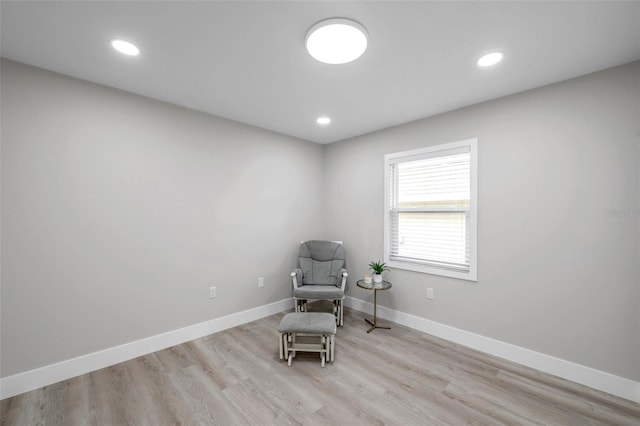 2585 Ridge Ln, Palm Harbor, FL 34684 - living area featuring wood finished floors and recessed lighting