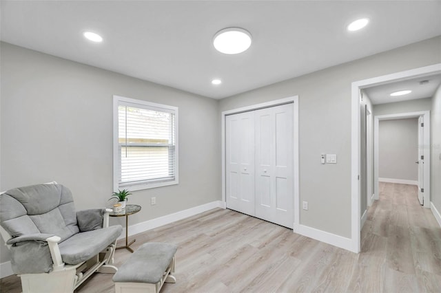 2585 Ridge Ln, Palm Harbor, FL 34684 - living area with light wood-type flooring and recessed lighting