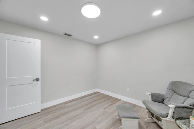 2585 Ridge Ln, Palm Harbor, FL 34684 - sitting room featuring light wood-style floors and recessed lighting