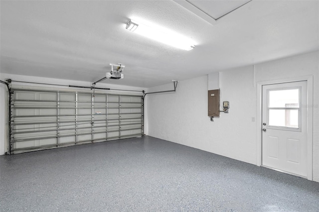2585 Ridge Ln, Palm Harbor, FL 34684 - garage featuring electric panel and a garage door opener