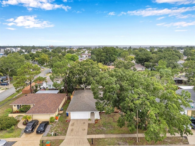 2585 Ridge Ln, Palm Harbor, FL 34684 - aerial perspective of suburban area with a tree filled landscape