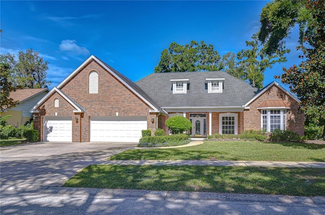 3012 Colonial Ridge Dr, Brandon, FL 33511 - view of front facade with brick siding, a front lawn, driveway, an attached garage, and a shingled roof