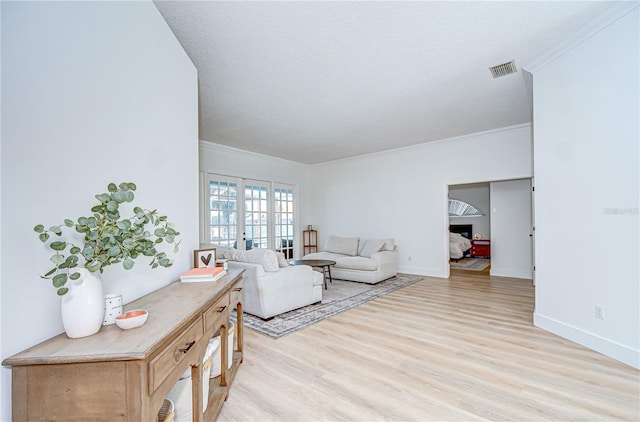 3012 Colonial Ridge Dr, Brandon, FL 33511 - living room with light wood-style floors and crown molding