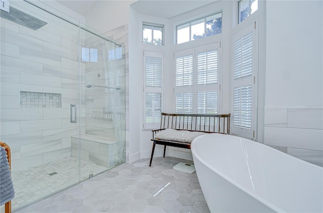 3012 Colonial Ridge Dr, Brandon, FL 33511 - full bath featuring a freestanding tub, a shower stall, and tile patterned floors