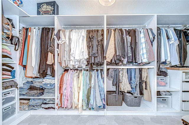 3012 Colonial Ridge Dr, Brandon, FL 33511 - walk in closet featuring tile patterned flooring