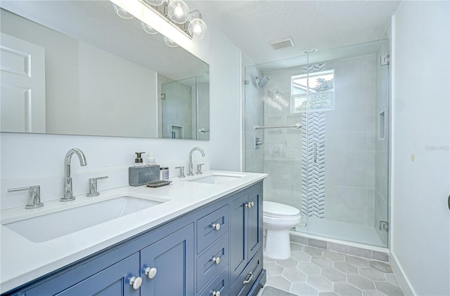 3012 Colonial Ridge Dr, Brandon, FL 33511 - full bathroom with tile patterned flooring, a stall shower, and double vanity