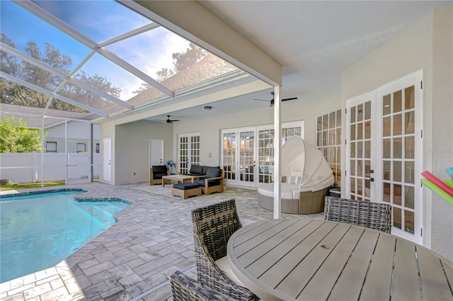 3012 Colonial Ridge Dr, Brandon, FL 33511 - view of swimming pool with french doors, ceiling fan, a patio, outdoor dining area, and an outdoor hangout area