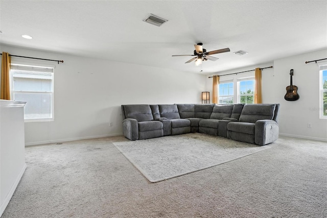 10603 Avian Forrest Dr, Riverview, FL 33578 - carpeted living area with ceiling fan and baseboards