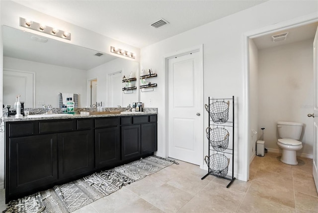 10603 Avian Forrest Dr, Riverview, FL 33578 - bathroom featuring double vanity and tile patterned flooring