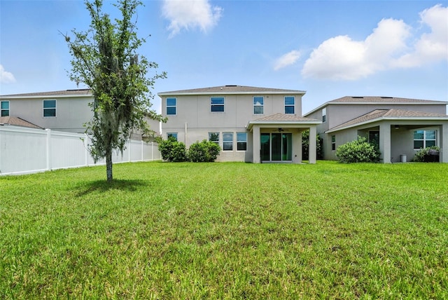 10603 Avian Forrest Dr, Riverview, FL 33578 - rear view of property with a ceiling fan and stucco siding