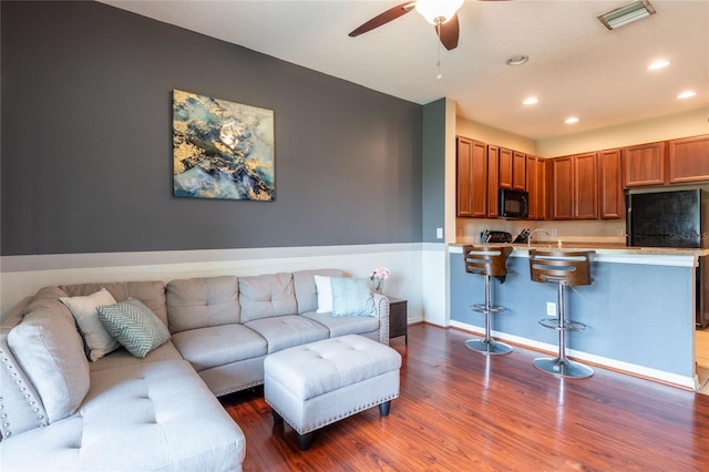 8814 Red Beechwood Ct, Riverview, FL 33578 - living room with wood finished floors, ceiling fan, and recessed lighting