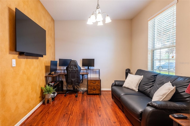 8814 Red Beechwood Ct, Riverview, FL 33578 - home office featuring wood finished floors and a chandelier