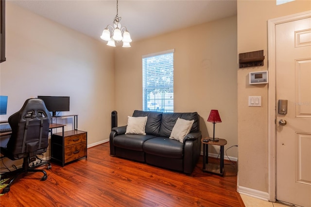 8814 Red Beechwood Ct, Riverview, FL 33578 - office with wood finished floors and a chandelier