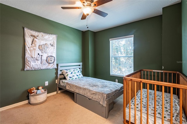 8814 Red Beechwood Ct, Riverview, FL 33578 - carpeted bedroom featuring baseboards and ceiling fan