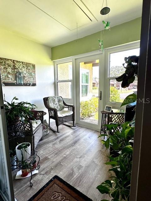1701 Pinehurst Rd Unit 13C, Dunedin, FL 34698 - view of sunroom / solarium