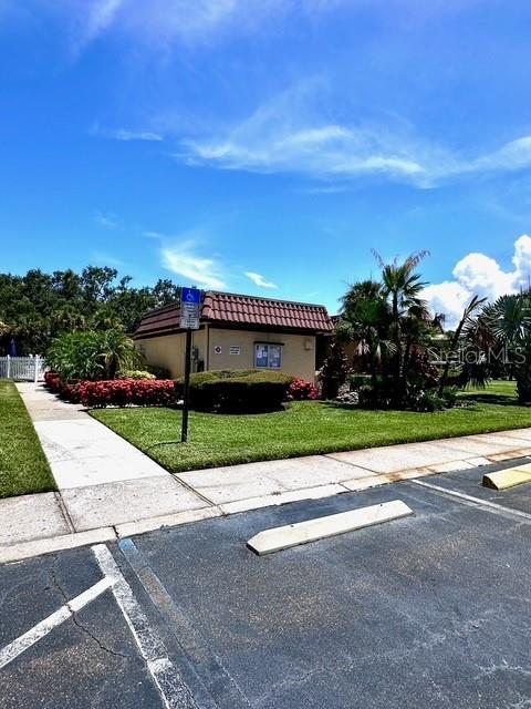 1701 Pinehurst Rd Unit 13C, Dunedin, FL 34698 - view of uncovered parking lot