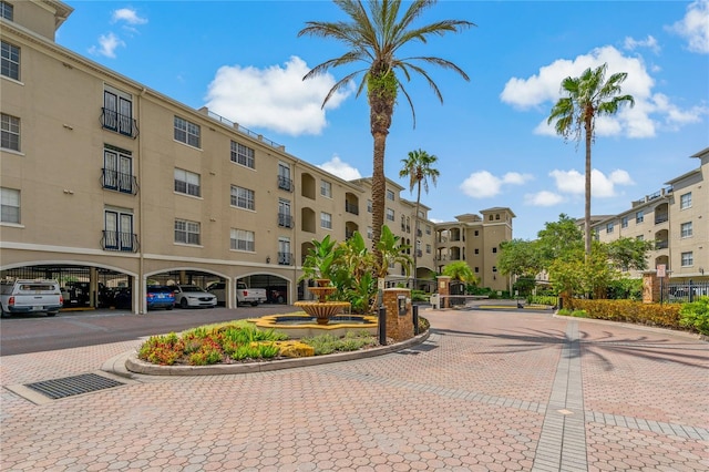 501 Knights Run Ave Unit 1317, Tampa, FL 33602 - view of building exterior featuring covered parking