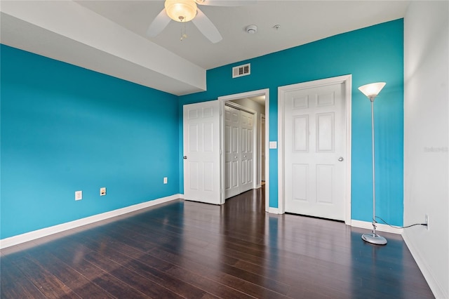 501 Knights Run Ave Unit 1317, Tampa, FL 33602 - unfurnished bedroom with wood finished floors, ceiling fan, and a closet