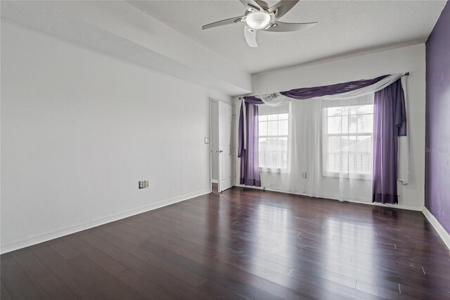 501 Knights Run Ave Unit 1317, Tampa, FL 33602 - unfurnished room with ceiling fan and dark wood-type flooring