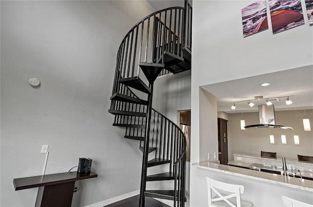 501 Knights Run Ave Unit 1317, Tampa, FL 33602 - staircase featuring a towering ceiling