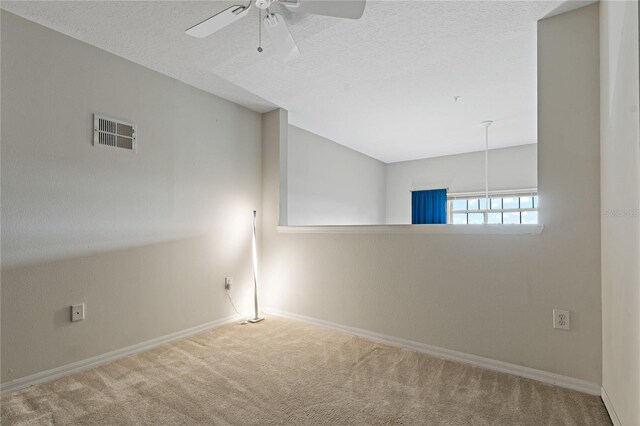 501 Knights Run Ave Unit 1317, Tampa, FL 33602 - carpeted spare room featuring ceiling fan and a textured ceiling