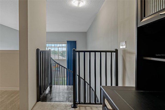 501 Knights Run Ave Unit 1317, Tampa, FL 33602 - stairs featuring carpet floors and a textured ceiling