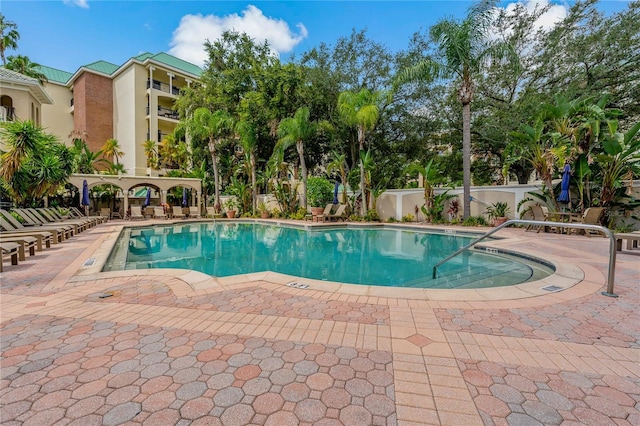 501 Knights Run Ave Unit 1317, Tampa, FL 33602 - community pool featuring a patio