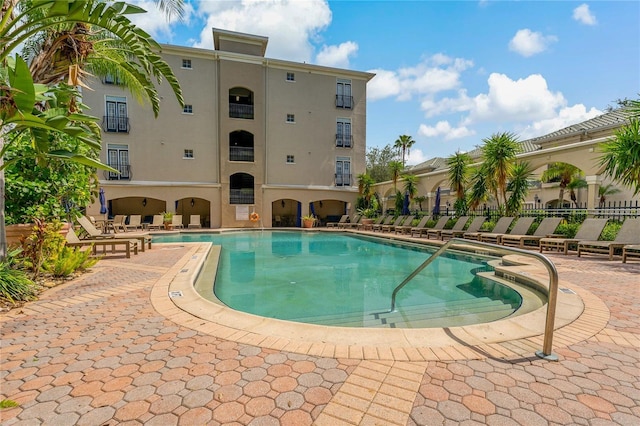 501 Knights Run Ave Unit 1317, Tampa, FL 33602 - community pool featuring a patio area