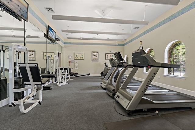 501 Knights Run Ave Unit 1317, Tampa, FL 33602 - gym featuring a ceiling fan and beam ceiling